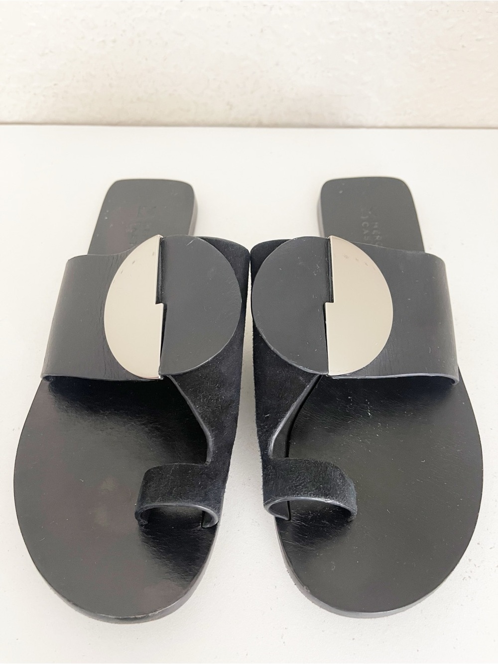 Mercedes Castillo Costanzah black leather sandals with a silver metal Toe loop